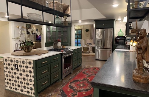 Austin Ave. House | Curated boutique stay in a 1920s English bungalow. Modern twist on a classic!