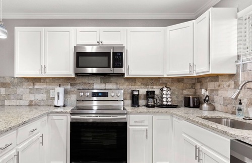 Leon Valley House | CYC Eclectic Back House with BBQ Gazebo