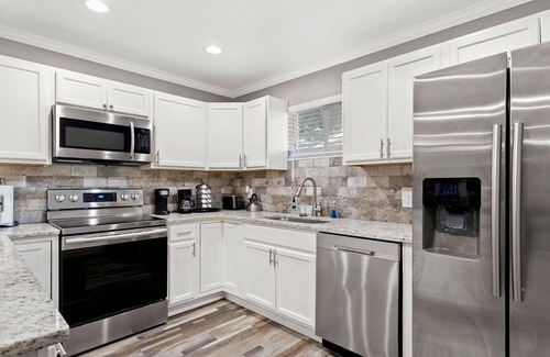 Leon Valley House | CYC Eclectic Back House with BBQ Gazebo