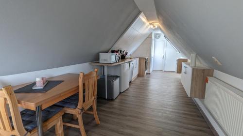 Nordleda Apartment | Dachgeschosswohnung Wilhelm