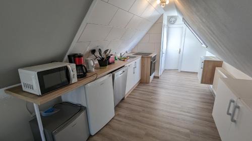 Nordleda Apartment | Dachgeschosswohnung Wilhelm
