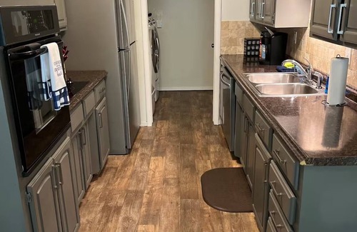 South Tulsa Condo | Darling 3-bedroom Duplex with Gameroom!
