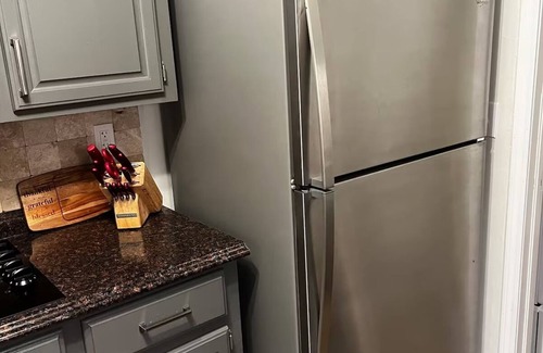 South Tulsa Condo | Darling 3-bedroom Duplex with Gameroom!