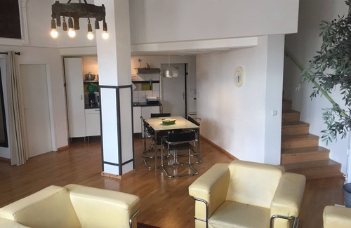 Friedrichshain-Kreuzberg Apartment | Loft above the rooftops of Berlin