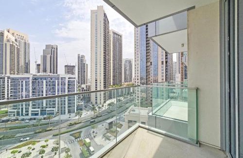 Dubai Apartment | Deluxe 1-Bedroom in The Grand - Waterfront and Skyline Views