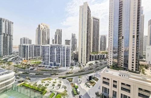 Dubai Apartment | Deluxe 1-Bedroom in The Grand - Waterfront and Skyline Views