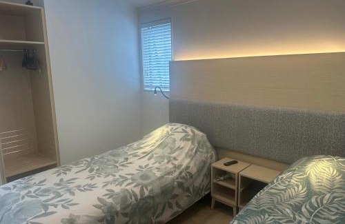 Palm Beach House | Deluxe Bedroom in SHARED 95m Premium Apartment at Waiheke Island Resort