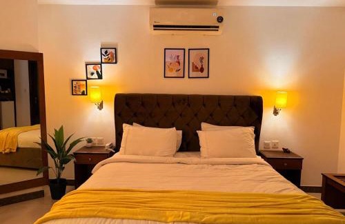Islamabad Apartment | Deluxe King with Sunset Yellow Hues in Bahria Phase 4 Islamabad