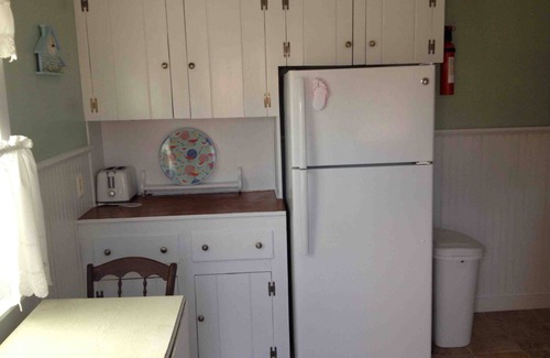 Dennis Port Cottage | Dennisport : Dog Friendly with a fenced in large yard. 1/2 mile from beach