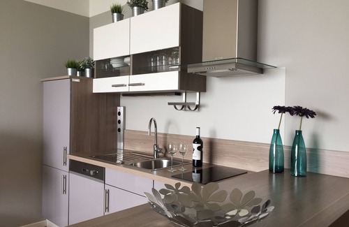 Toscolano Maderno Apartment | Design apartment - 100 sqm green terrace - Pool - Fantastic panoramic lake view