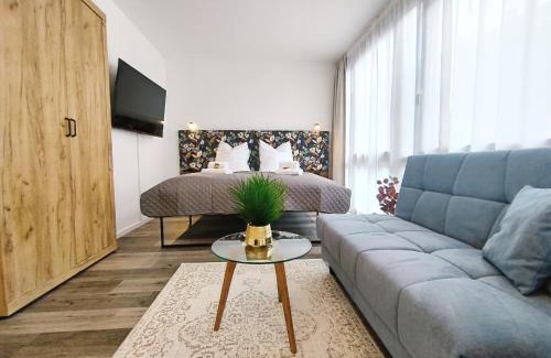 Mitte Apartment | Design-Apartmenthaus für bis zu 12, modern, Dachterrasse, Grill, ruhige Lage, Disney plus, Wii, LAN und WLAN
