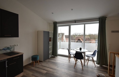 Volkach Apartment | Designer apartment with balcony in the heart of the old town