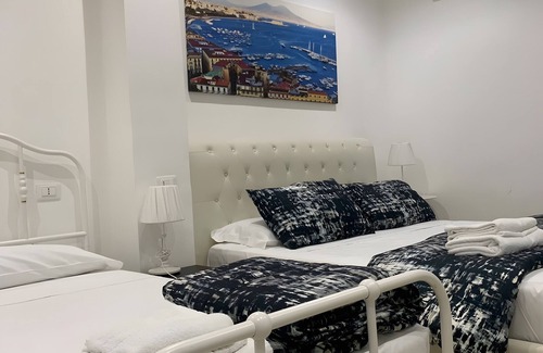 Rione Sanita Bed & Breakfast | Di Palma Suite Family Room with Shared Terrace, Wi-Fi, and Air Conditioning