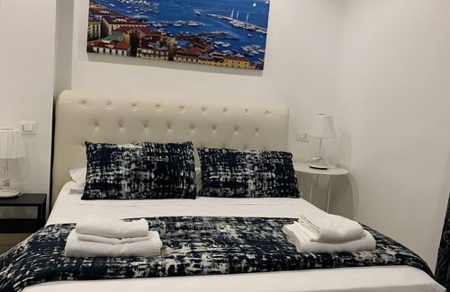 Rione Sanita Bed & Breakfast | Di Palma Suite Family Room with Shared Terrace, Wi-Fi, and Air Conditioning