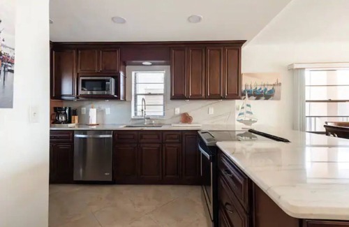 Port Canaveral Condo | Direct River gorgeous view! Newly remodeled, quartzite counter open floor plan