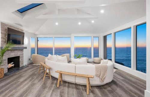 Montara House | Distinguished Oceanfront Point Estate with Iconic Beach Mountain Vistas