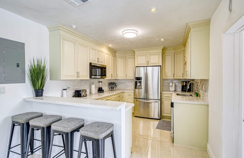 Pompano Beach House | Dog-friendly canal-front home with pool, foosball, washer/dryer, & central AC