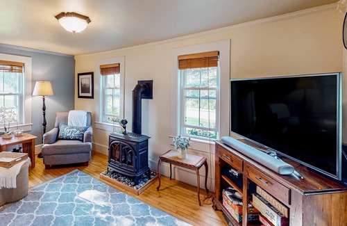 Charlotte House | Dog-friendly cottage with gorgeous setting, mountain view, deck & fireplace