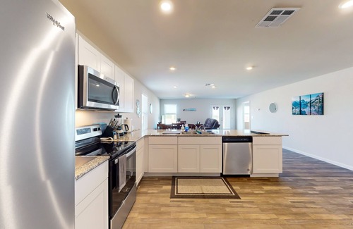 Pomerene House | Dog-friendly modern home with children's items, open-concept layout, & W/D