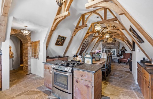 Sandpoint House | Dog-friendly mountain castle with a washer/dryer, private hot tub, & fireplace