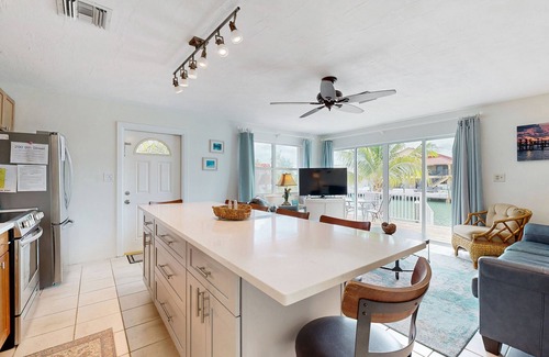 Key Colony Beach House | Dog-friendly waterfront home with dock, pool, gas grill, & beach access