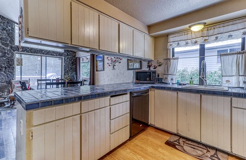 Brightwood House | Dog-friendly waterfront home - WiFi, river views, private hot tub & shared pool