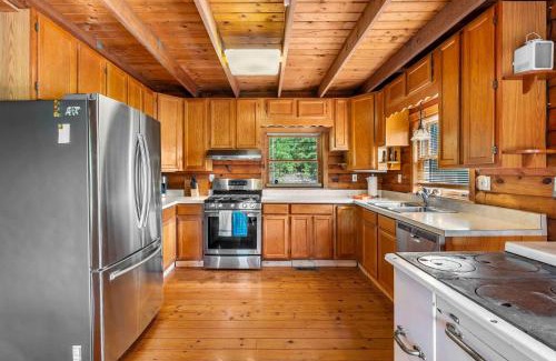 Baker Ski Chalet | Dog Friendly with Fire Pit and Yard by the River