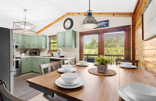 Sevierville Cabin | Dollywood 1 mi! Mountain View, Hot Tub, Fire Pit, King Suites, Arcade, Dogs OK!