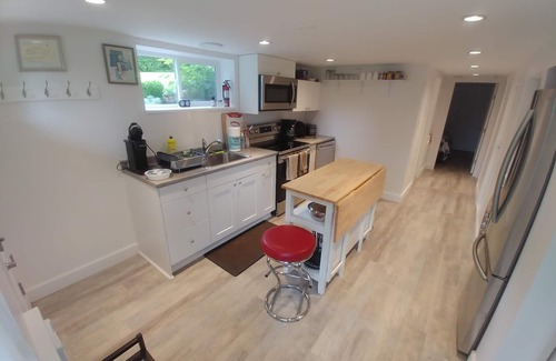 Sidney House | Dominion Brook Park Vacation Rental - Beautiful suite with garden/park views.