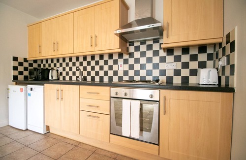 Doolin House | Doolin Village L06 - a two-story lodge that sleeps 6 guests in 3 bedrooms