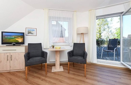 Neuharlingersiel Cottage | Doppelzimmer mit Balkon Oder Terrasse - Doppelzimmer in der Hotel-pension Marlies
