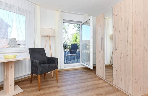 Neuharlingersiel Cottage | Doppelzimmer mit Balkon Oder Terrasse - Doppelzimmer in der Hotel-pension Marlies