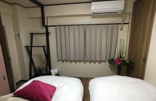 Namba Apartment | Dotonbori Namba Kuromon Market 5 minutes on foot ・ Namba Shinsaibashi area within 10 minutes ・ With Pocket Wi-Fi