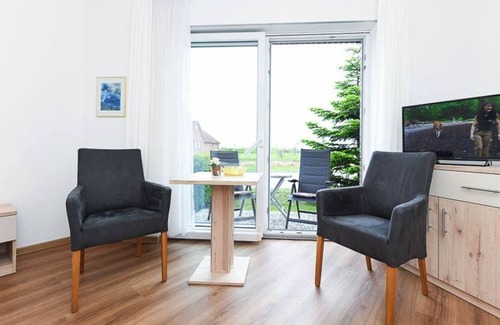 Neuharlingersiel Cottage | Double room with balcony or terrace - Double room in the Hotel-Pension