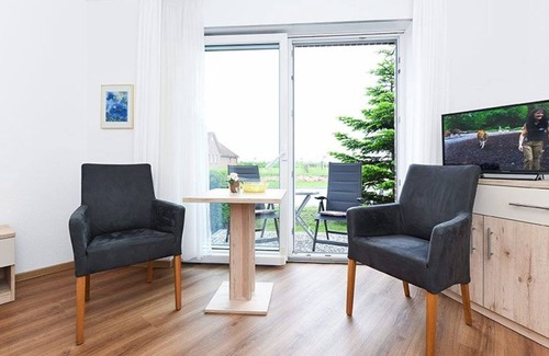 Neuharlingersiel Cottage | Double room with balcony or terrace - Double room in the Hotel-Pension