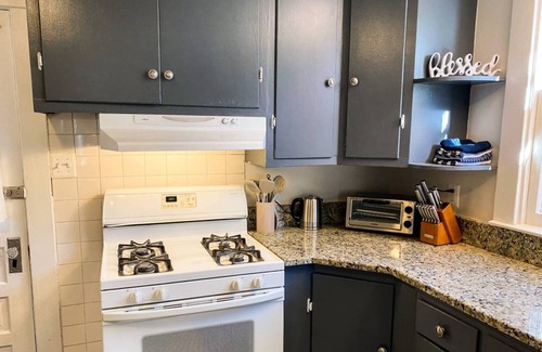 Annapolis House | Double-sided Navy-themed Home with Hot Tubs and Parking at Pet Friendly, Private Fenced-In Backyard