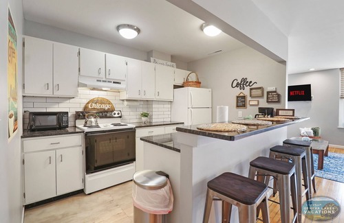 Lake Geneva Apartment | Downtown Lake Geneva-Chicago |Above Shops on Main |Onsite Parking |Fun Themed Urban Apartment |King