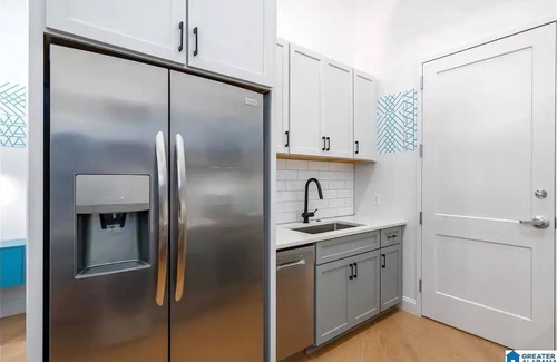 Central City Condo | Downtown Luxe Industrial Loft in Mercantile on Morris! Free parking! Dogs ok.