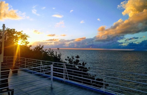 Deshaies Villa | Dream stay! Large villa with swimming pool, above the beach, sea view.