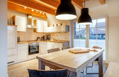 Neßmersiel House | Dream vacation home NordseeStar with fireplace and lounge in Neßmersiel