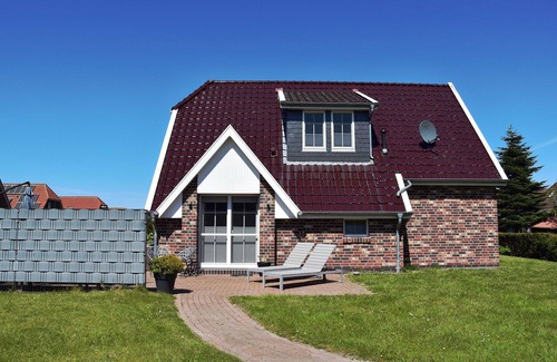 Neßmersiel House | Dream vacation home NordseeStar with fireplace and lounge in Neßmersiel
