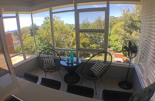Mount Ousley House | Drift - Artistic retro beach inspired house