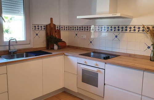 Caserio Los Tarquinos Apartment | Duplex overlooking pools and mountains in Altaona Golf