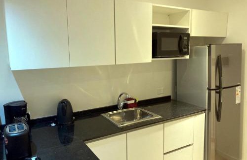 San Cristobal Apartment | Dzain Confort, gym, parrilla, estacionamiento , playroom cerca de todo