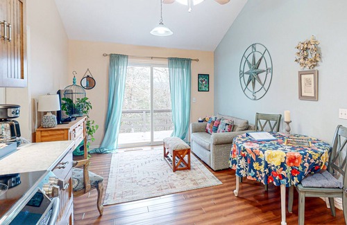 Holiday Island Condo | Eclectic condo with WiFi, a deck, near hiking, tennis, & lake
