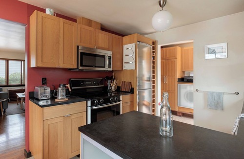 Rainier Valley House | Eclectic Redbrick Rambler near Japanese Gardens