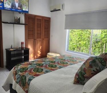 Girardot House | El Peñón golf course tennis BBQ private pool