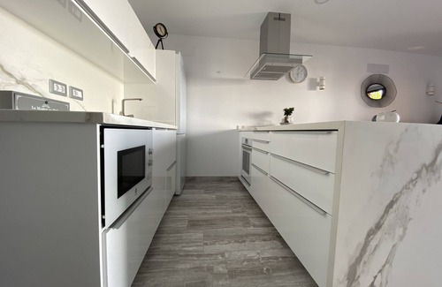 Playa del Aguila Condo | Elaborately renovated vacation apartment located directly on the beach