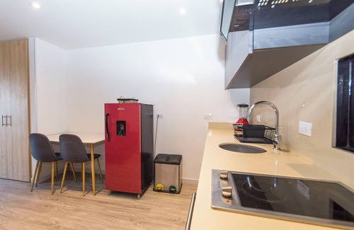 Antiguo Country Apartment | Elegant apartment with view of the city, mountains, 500 MB, swimming pool, gym and spa