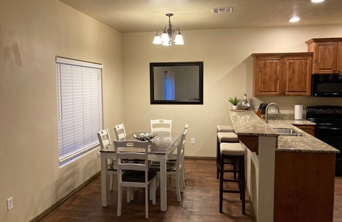 Cedar City House | Elegant Cedar Ridge Escape with clubhouse amenities - pool, hot tub, gym, grill.